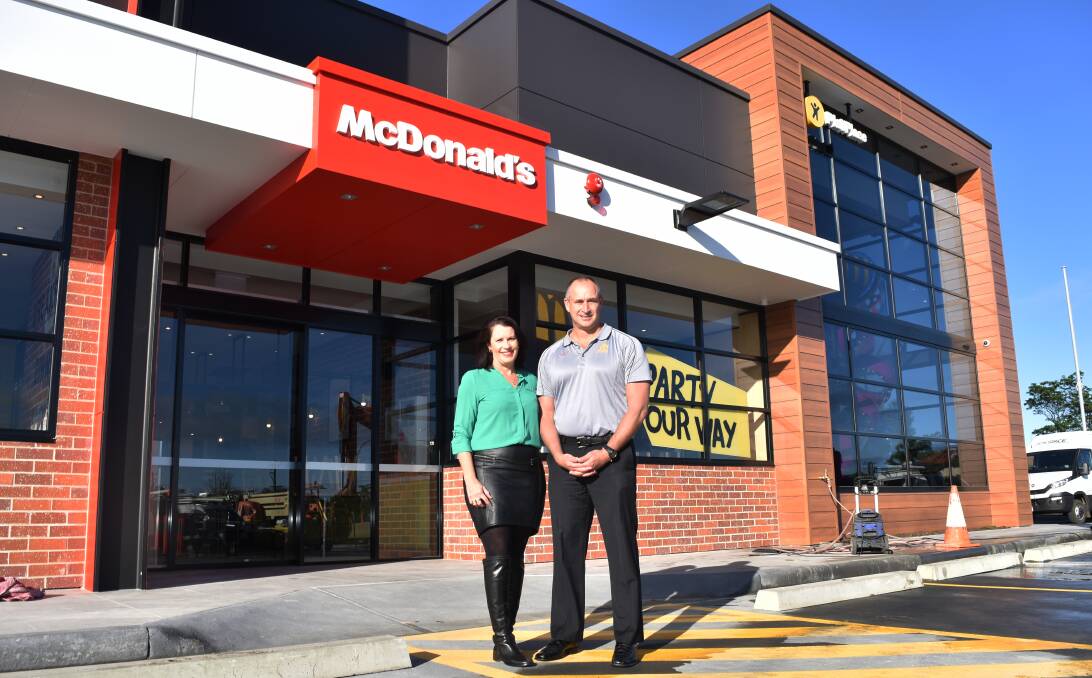 Delicious: Grant and Amanda Smith are thrilled to be opening their second McDonald's fast food outlet complete with two-storey playground and a burger bar.