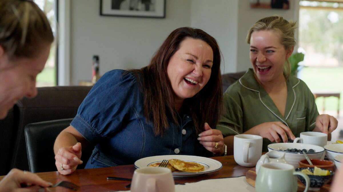 Farmer "Dusty" Dusto Dustin's mum, Alison, played by Kate Langbroek, shares a few secrets with his girls at the brekky table. Picture supplied