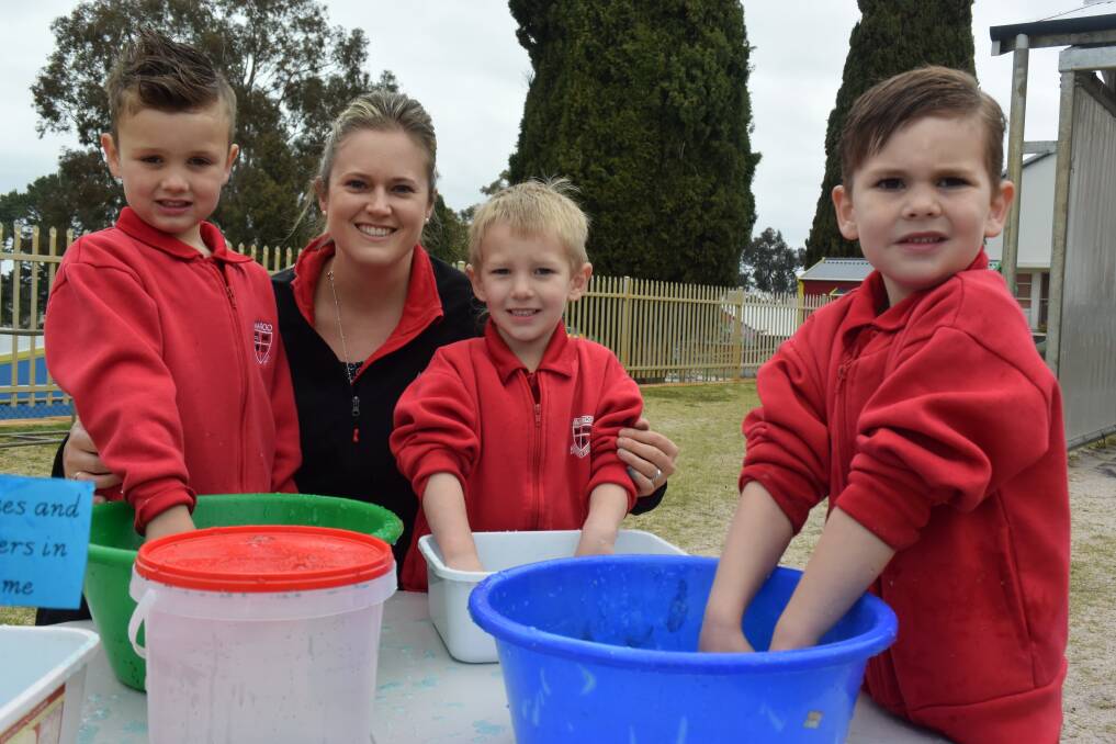 Play time: Quade Bucktin, Kayden Dunster, Knox Harker and Bronwyn Kippin played with spiders and snakes in slime during 'S' sound day.