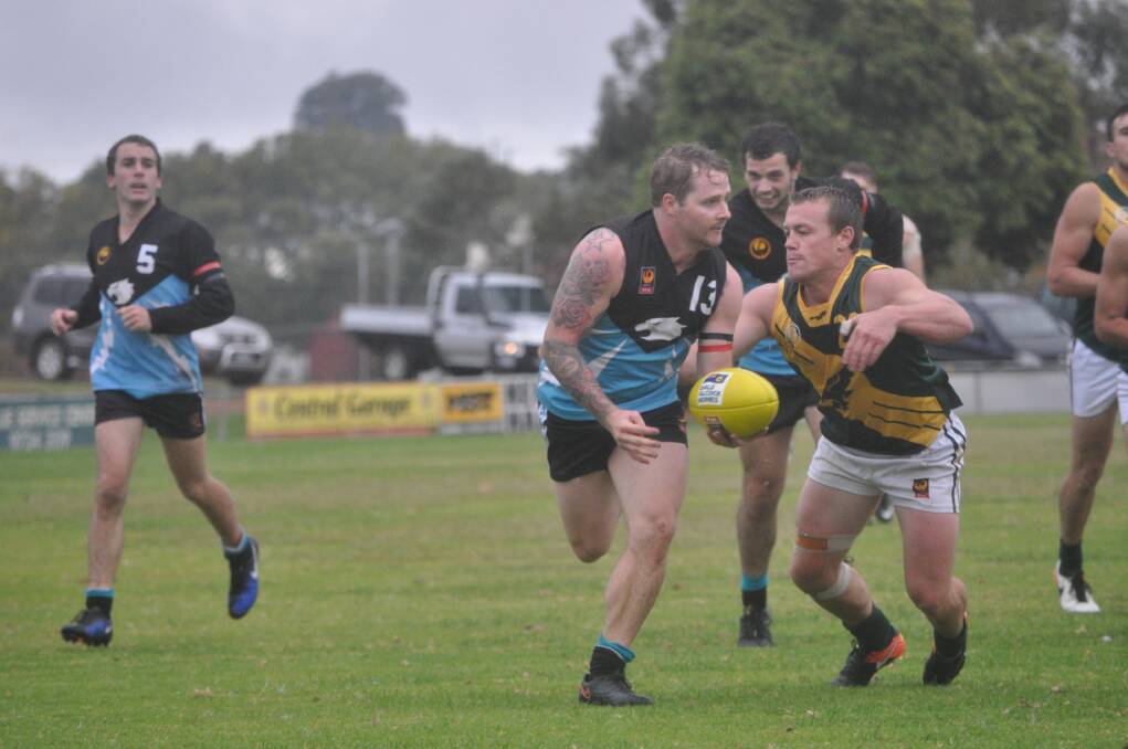 Holding steady: Collie Eagles Football Club's Adam Bignell looking for a free player up forward during his side's match against Augusta-Margaret River Hawks on Saturday, May 20. Photo: Thomas Munday. 