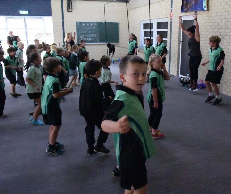Fit and healthy: Allanson Primary School students and teachers engaged in a fitness class on Thursday, February 9. Photo: Thomas Munday. 
