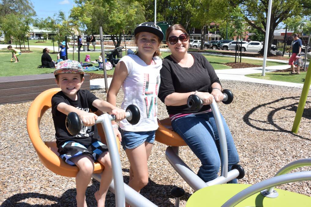 Happy times: Rydah, Keeley and Kasey Collier took on Collie Central Park's array of games and activities including the see-saw. 