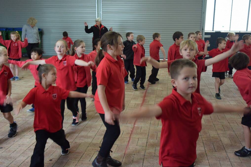 Amaroo Primary School kids and teachers took to dancesport classes this week. Photos: Thomas Munday. 