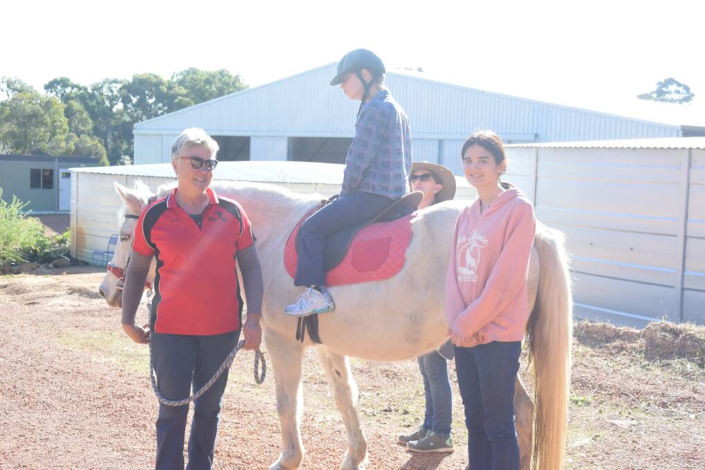 In focus: RDA Collie coach Jo Williams, rider Brandi Innis and Shavarna Gibson training for this year's Winter Games in July. Photo: Thomas Munday. 