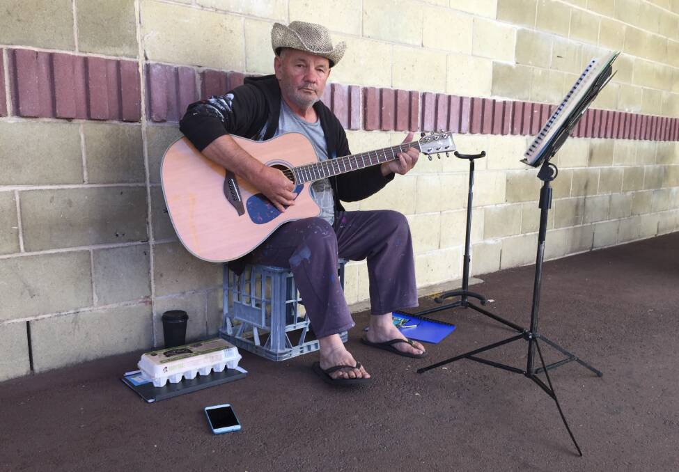 The right notes: Busker Joseph Cosmic performs outside Collie Central Shopping Centre twice per week. Photo: Thomas Munday. 