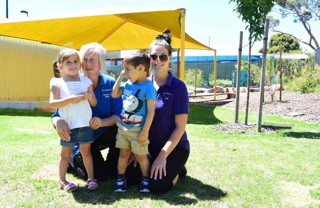 Love and care: Jenny Fry, Kim Petherick, Stella Collins and Zak Ashfaq, of the Collie Early Education Centre, celebrating the Collie Early Education Centre's first birthday. Photo: Thomas Munday.