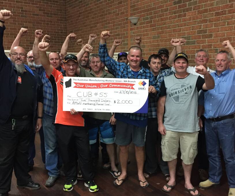 Together: Australian Manufacturing Workers' Union members at Premier Coal raised $2000 for sacked Carlton and United Breweries workers. Photo: Glenn McLaren. 