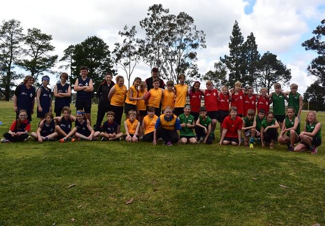 Football frenzy: The students of Amaroo PS took part in the Grand Final parade and football games for the Survivor program. 