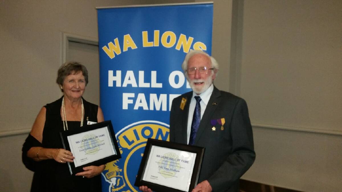 Collie Lions Club members Lyn Mitchell and Jeff Needham (on behalf of Irma Needham) accept their awards.