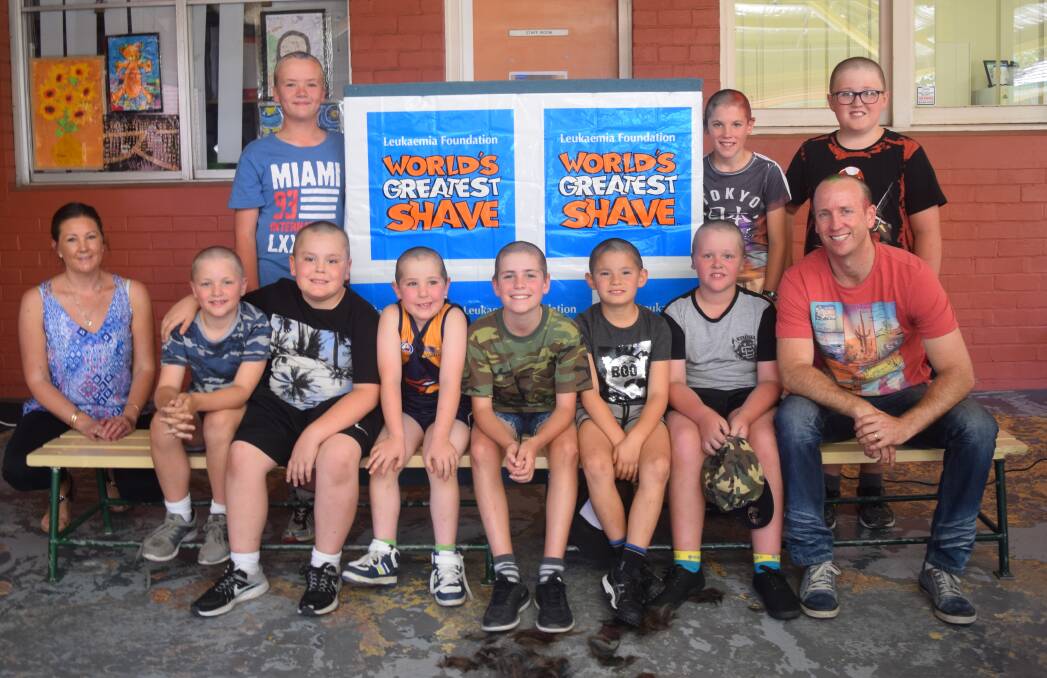 St Brigid’s students Charlie McDonald, Ben Hart, Diesel Davies (all standing), Jack McDonald, Gary Holden, Logan Elks, Toby Hanns, Mitchell Cheng and Henry McDonald along with principal Daniel Graves raised money for the Leukaemia Foundation by taking part in the World’s Greatest Shave.