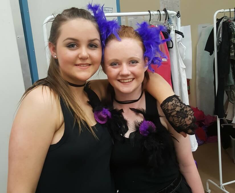 In the spotlight: Seniors Alyssa Harrold & Bree Allen were beaming with anticipation backstage, waiting to dance to "Bad Influence".