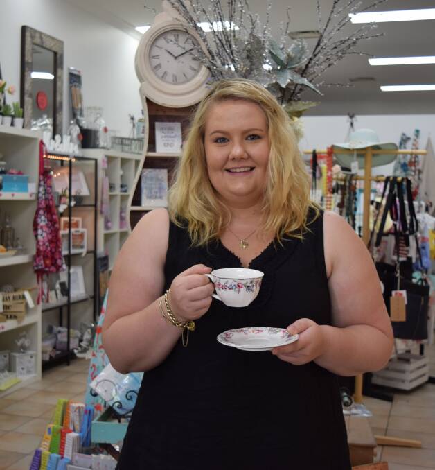 Tea time: Kaitlin Woodhouse from Cheeky Squirrel holds part of the prize for best decorated Pav. Photo: Shannon Wood. 