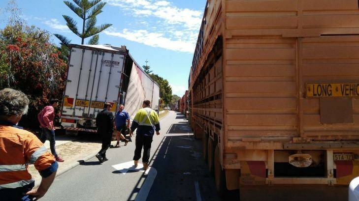 A crash between a car and a truck on the Stirling Bridge in Fremantle has blocked traffic in both directions. Photo: Barry Tonkin