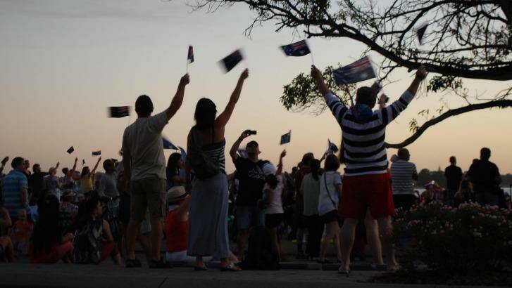 Volunteers distributed 60,000 flags ahead of a world record attempt. Photo: Candice Barnes