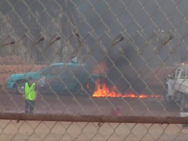 Burnin' rubber: Ethan Genev's car on fire