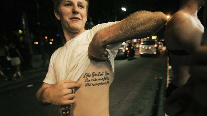 "A spur of the moment thing": Aidan King shows his tattoo.  Photo: Nic Walker