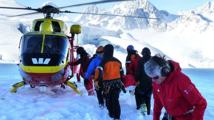 Rescuers and colleagues recover the body of an Australian soldier killed on New Zealand's Aoraki Mount Cook on Wednesday. Photo:  Christchurch Press