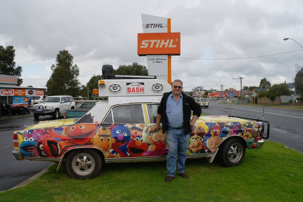 Set to go: Barry Piavanini from Collie Mowers and More with the Solahart car.