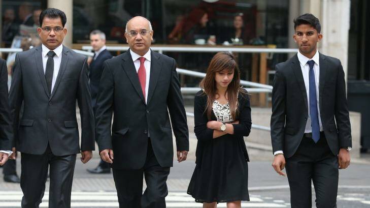 Benedict Barboza (left), husband of Jacintha Saldanha arrives at The  Royal Courts of Justice with his son Junal (right) and daughter Lisha and Member of Parliament Keith Vaz. Photo: Peter Macdiarmid/Getty Images