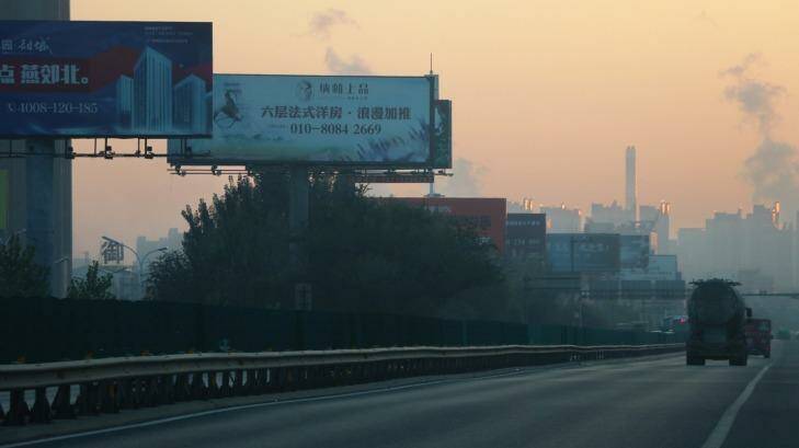The road to Yanjiao is filled with billboards advertising residential property developments Photo: Sanghee Liu