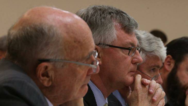 Martin Parkinson (centre) at the Australian National University on Monday. Photo: Andrew Meares