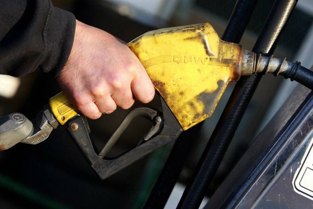 Paying at the pumps: The government says money raised from the fuel tax will all be spent on roads. Photo: James Davies