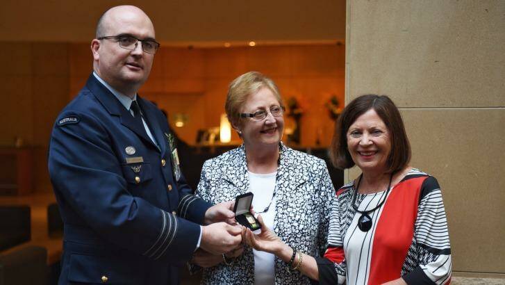Wing-Commander Nathan Klos will present the watch to Rhonda Marchant (right). Photo: Nick Moir