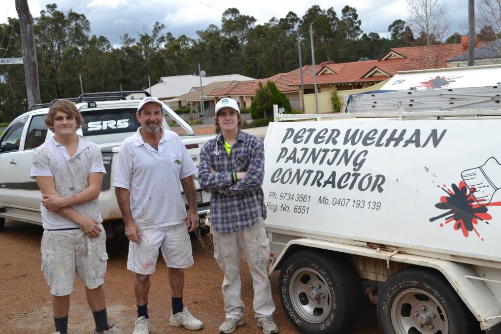 On the job: Dylan McCormick, Peter Welhan and Ryhs Atherton of Peter Welhan Painting Contractor.