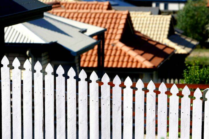 REALESTATE AFR PHOTOGRAPH BY GLENN HUNT 30 OCTOBER 2007.  GENERIC- houses, interest rates, building, house market, housing, home, homes, springfield lakes, realestate, construction, renting, land.  AFR FIRST USE ONLY SPECIALX 00000000
white picket fence; roofs