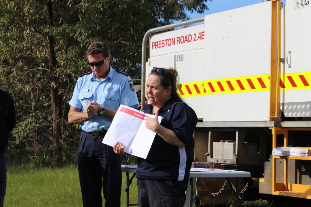 Be prepared: DFES personnel Mark Nolan and Selina Miles.