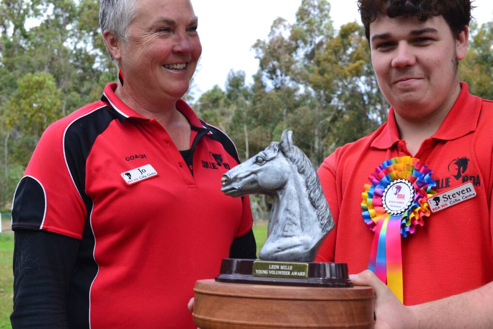 Award: RDA state president Jo Williams presents Steven Murphy with the Leon Mills young volunteer memorial award.