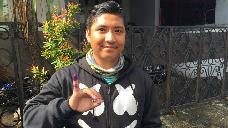Fadli, 18, after casting his vote for Agus Harimurti Yudhoyono at Tanah Abang, Central Jakarta.   Photo: Jewel Topsfield