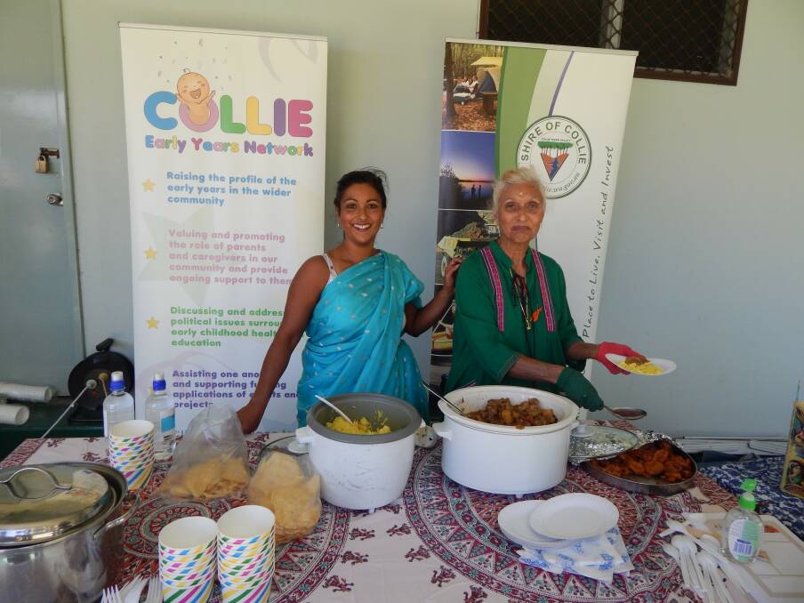 Delicious aroma: Sandra Robertson and Blanche Faries create mouth-watering culinary delights at Collie's Family Festival of Food, one of a series of Harmony Day events held in the town.