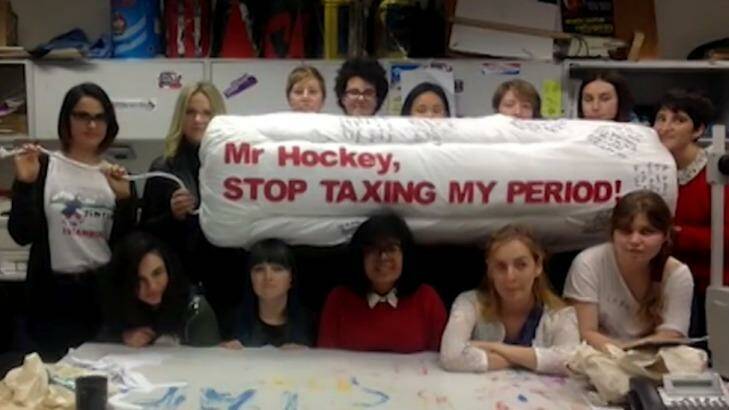 "Stop taxing my period": A video questioner poses her question in a manner that stopped the treasurer in his tracks. Photo: ABC