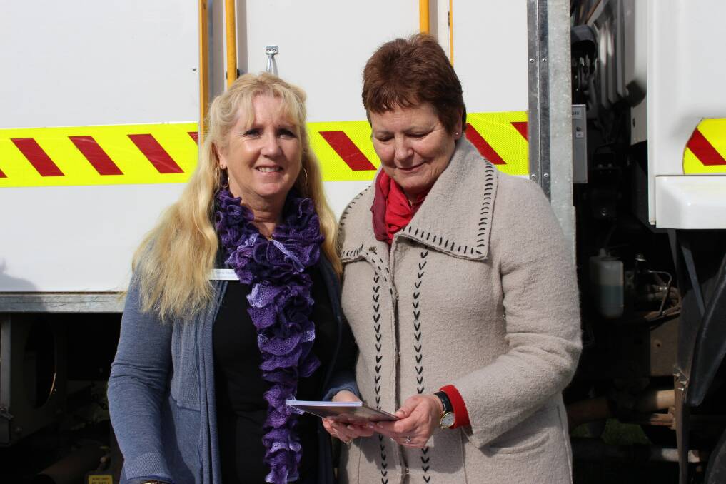 Catch up: Donna Davies, Sylvia Miles at the bushfire preparedness day held on Saturday.           Photos: Olivia Wells