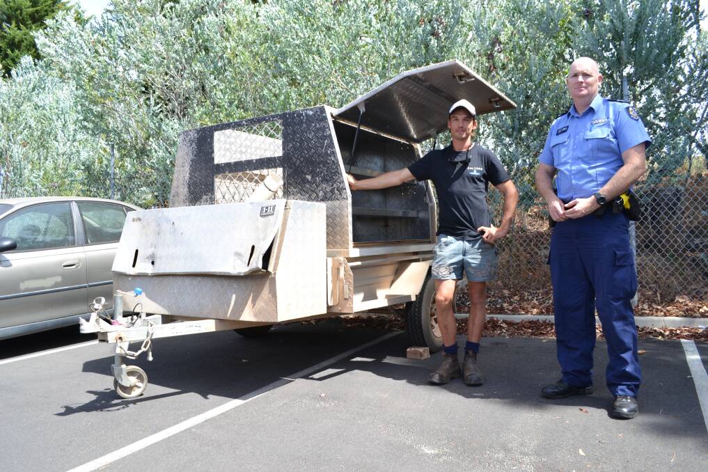 Devastation: Constable Dow and Brendan Earl survey the empty trailer.