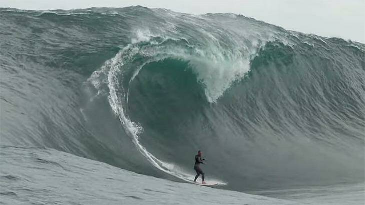 Former West Coast Eagle Phil Read is dwarfed by this monster wave at The Right. Photo: XXL Big Wave Awards