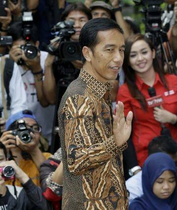 Indonesian president-elect Joko Widodo, popularly known as "Jokowi", and his wife Iriana.