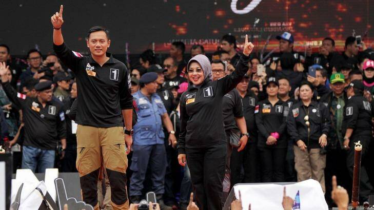 Jakarta gubernatorial candidate Agus Harimurti Yudhoyono, left, with his running mate Sylviana Murni  at the rally on February 11. Photo: Jefri Tarigan