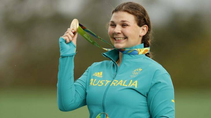 Catherine Skinner shows off her gold medal. Photo: Hassan Ammar