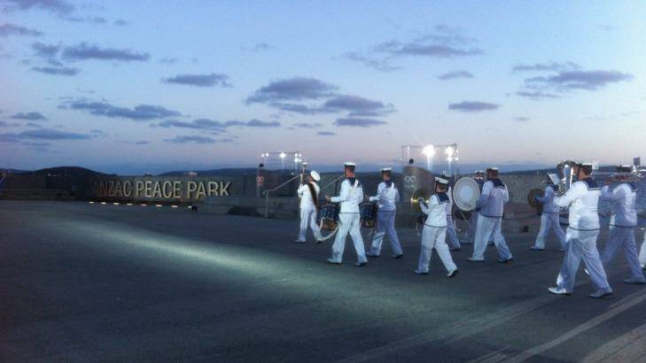 Remembering them, 100 years on: The Royal Australian navy performs the sunset ceremony.