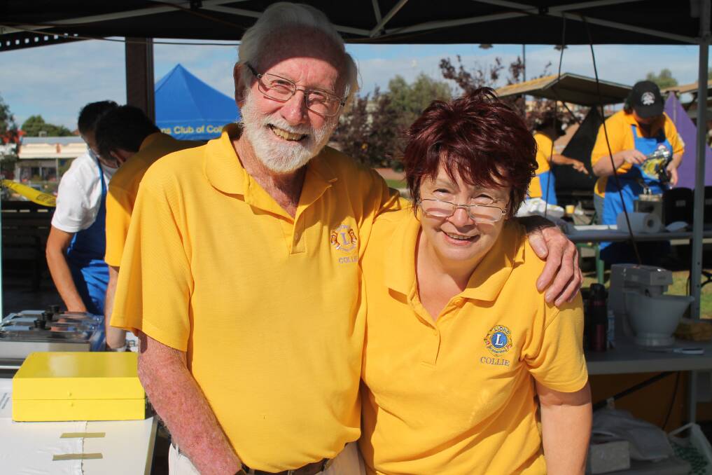 Helping out: Jeff Needham and Helga Henke help raise funds at the barbecue.