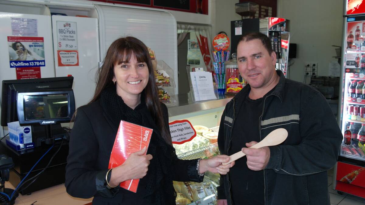 The Collie Mail's Lisa Gillespie is ready to give Steere Street Deli's Darcy Buckle the wooden spoon if he can't pick his performance up before the end of the season. Ms Gillespie is holding the first place prize - return tickets to Melbourne and an AFL Grand Final Package - to be awarded to this year's top tipster.