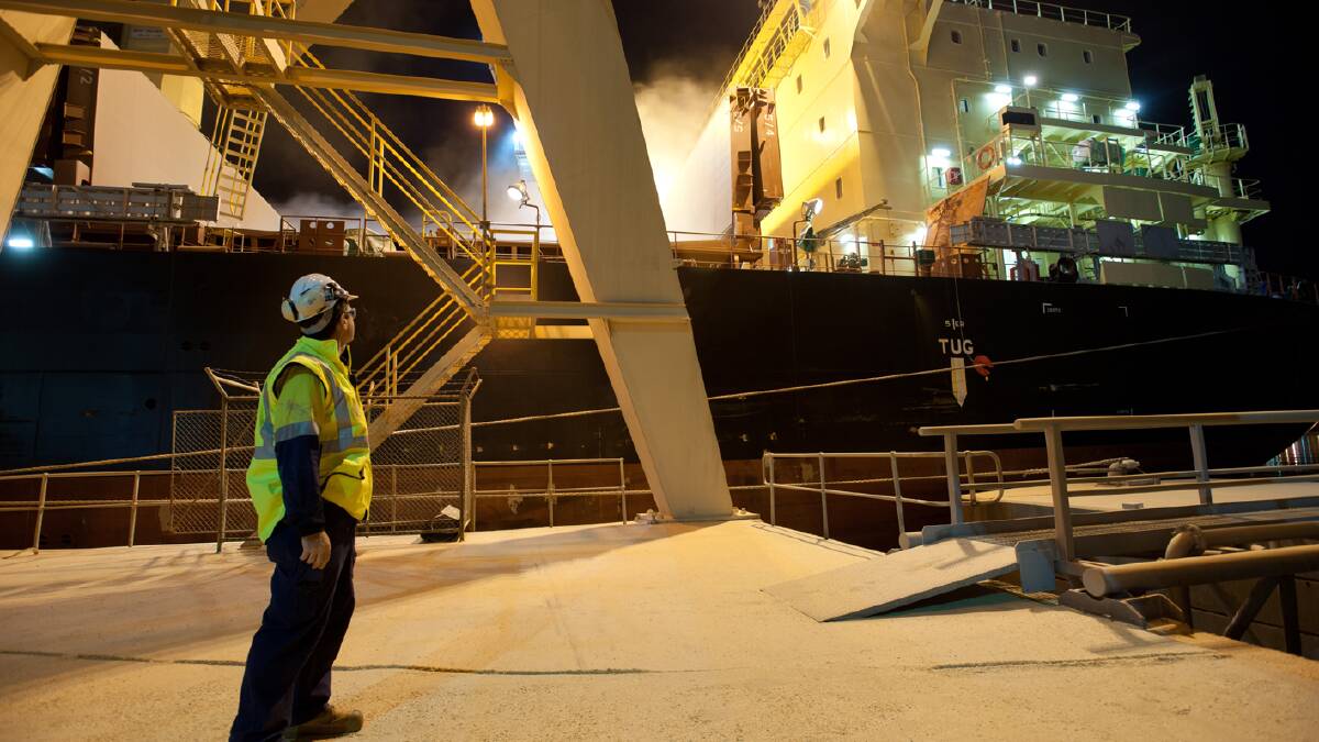 A Bunge Australia employee witnesses the very first shipment of WA grain loaded at Bunge’s Bunbury port facility. 