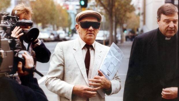 Church keeps sex abuse files secret: Gerald Ridsdale outside court with George Pell. Photo: Geoff Ampt

