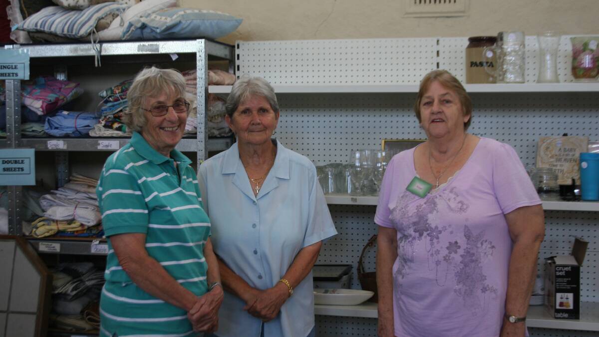 Op shop volunteers Gwen Molnar, Aileen Conlon and Kaye Burton. 