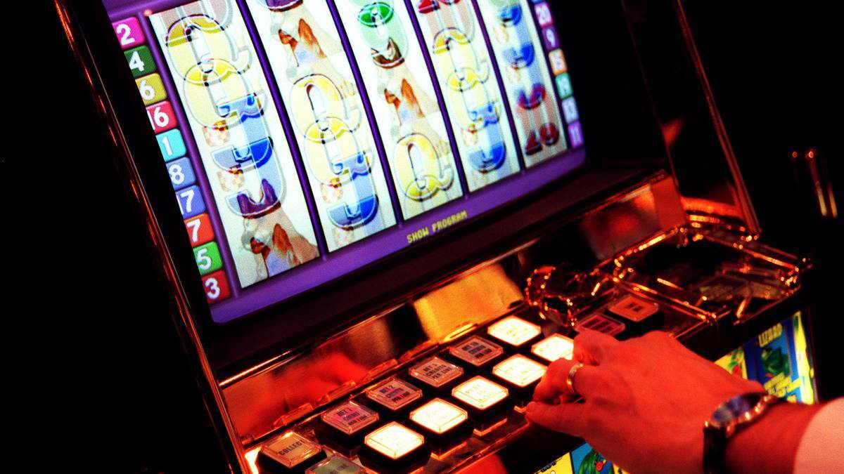 Who spent what on pokies in Victoria