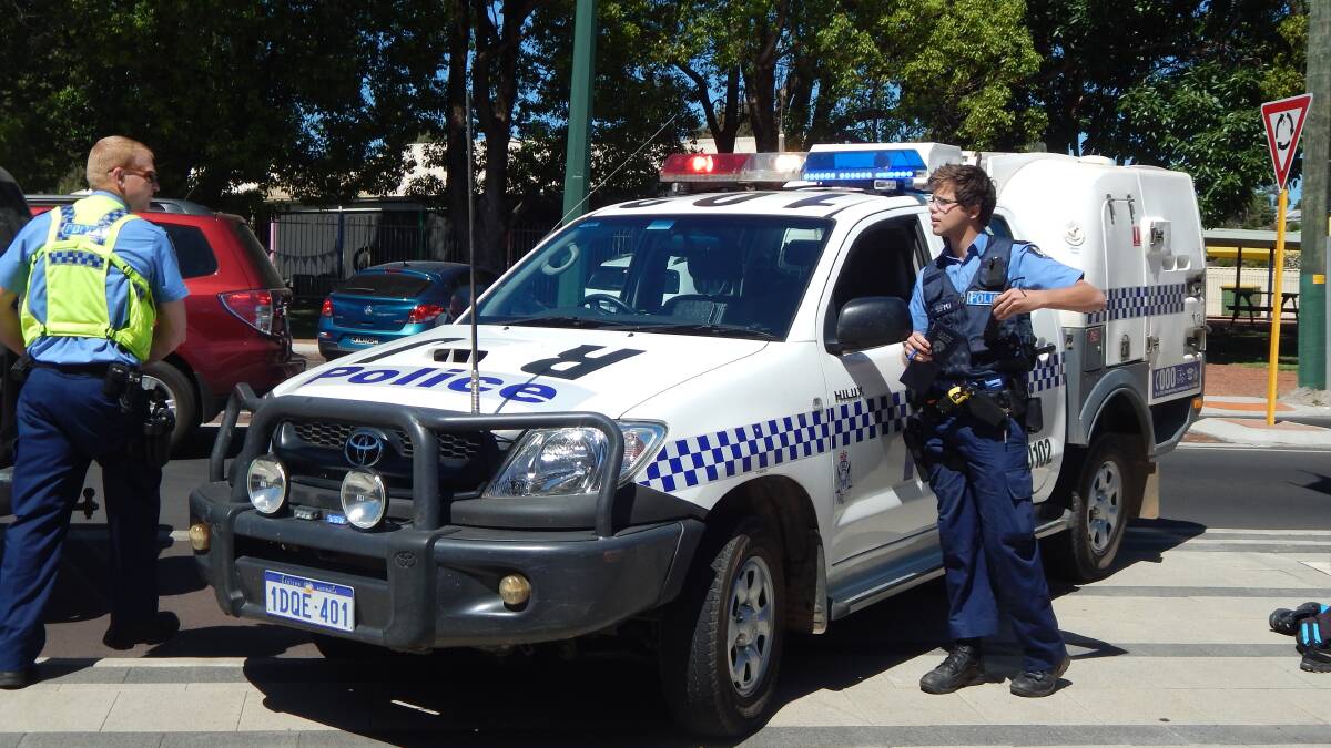 Collie police officers converged at the site of an armed holdup in Forrest Street on Monday morning.