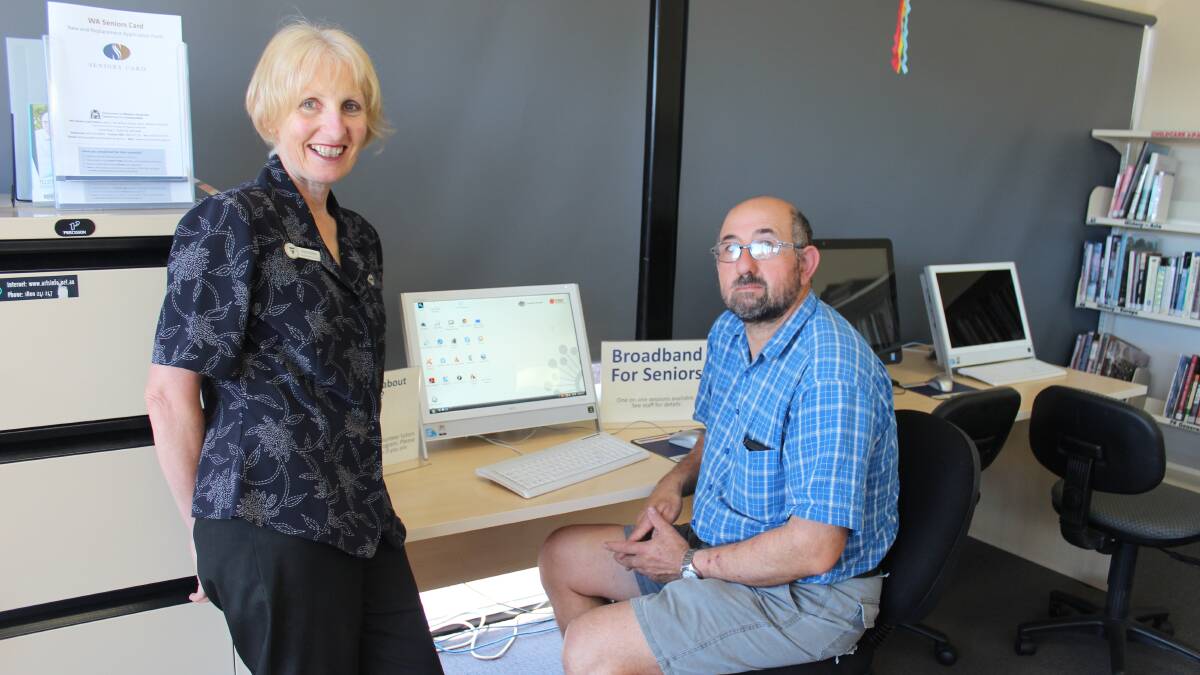 Collie Public Library manager Alison Kidman, and kiosk volunteer Dominic Surace