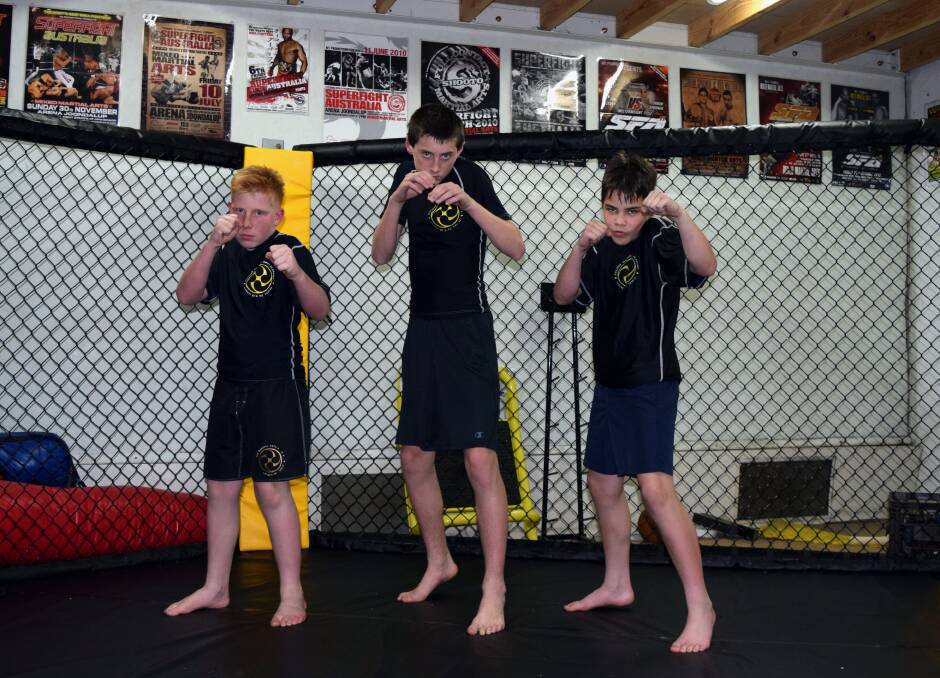 Ready for the fight: Hunter Buckley, Aiden Reid, and Justin O'Halloran have been training hard. 